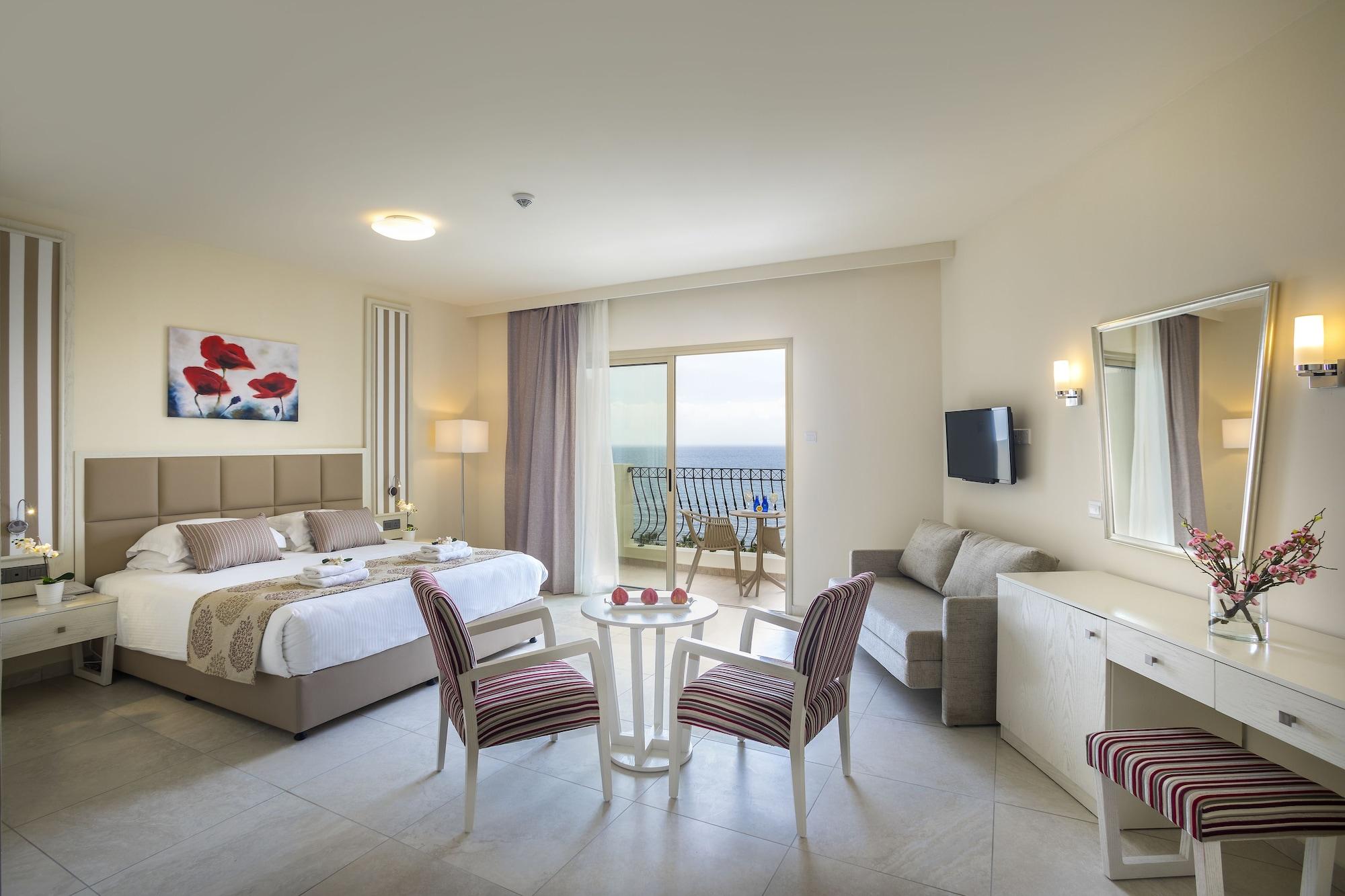 Aquamare Beach Hotel & Spa Paphos Exterior photo